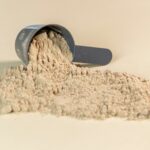 a scoop of powder sitting on top of a table